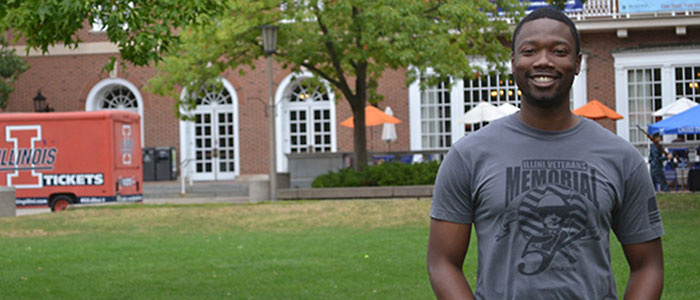 eager student standing in front of Illini Union