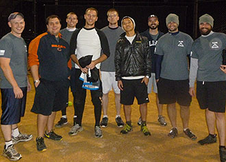 Eric Swenson on the left, and other members of the veterans' softball team.